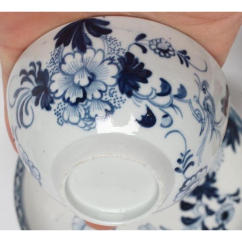 95 - A JAMES PENNINGTON PORCELAIN TEA BOWL AND SAUCER, 1765-70, painted in underglaze blue with the Bird ... 