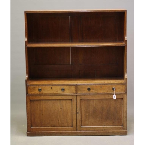 829 - A REGENCY MAHOGANY BOOKCASE, early 19th century, the reeded edged back with single fixed shelf, two ... 