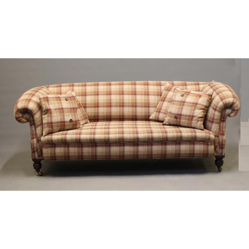 830 - A VICTORIAN WALNUT FRAMED CHESTERFIELD SOFA, upholstered in wool tartan, raised on turned legs with ... 