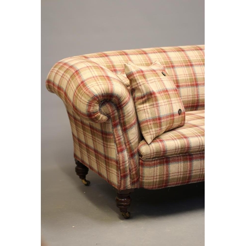 830 - A VICTORIAN WALNUT FRAMED CHESTERFIELD SOFA, upholstered in wool tartan, raised on turned legs with ... 