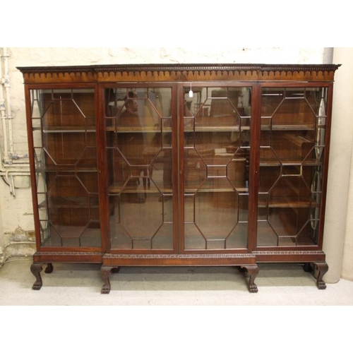 832 - A GEORGIAN REVIVAL MAHOGANY DISPLAY CABINET, early 20th century, of breakfront form with four astrag... 