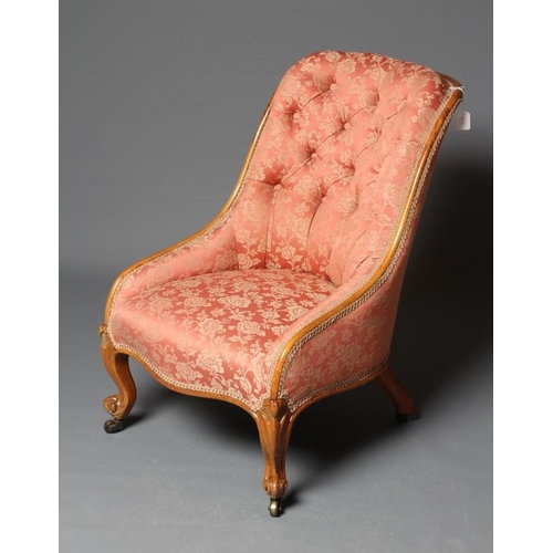 834 - A VICTORIAN WALNUT SHOW FRAME NURSING CHAIR, button upholstered in a dusky pink floral silk brocade,... 