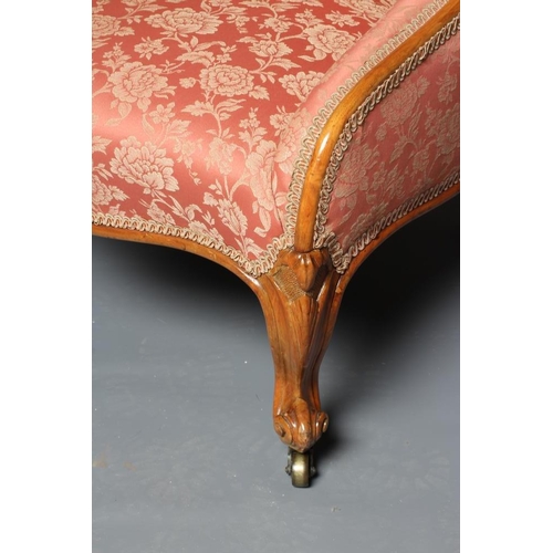 834 - A VICTORIAN WALNUT SHOW FRAME NURSING CHAIR, button upholstered in a dusky pink floral silk brocade,... 