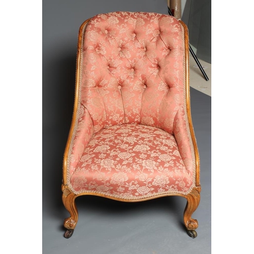 834 - A VICTORIAN WALNUT SHOW FRAME NURSING CHAIR, button upholstered in a dusky pink floral silk brocade,... 