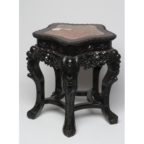 835 - A CHINESE HARDWOOD STAND, c.1900, the gadroon edged serpentine top inset with red marble, pierced an... 