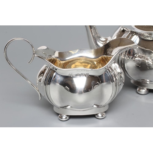 162 - A SILVER THREE PIECE TEA SERVICE, maker Joseph Gloster Ld., Birmingham 1922, of lobed oval baluster ... 