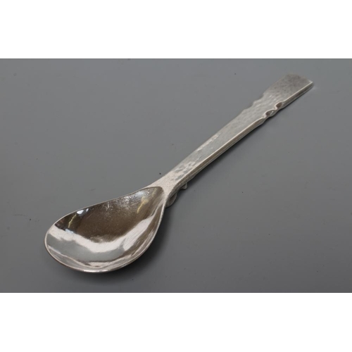 168 - AN ARTS AND CRAFTS SILVER PRESERVE SPOON, maker Guild of Handicraft, London 1941, the fig bowl with ... 