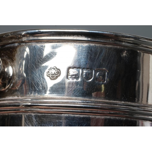 181 - A LATE VICTORIAN SILVER CUP, maker JB Carrington, London 1898, the single girdled U shaped bowl engr... 