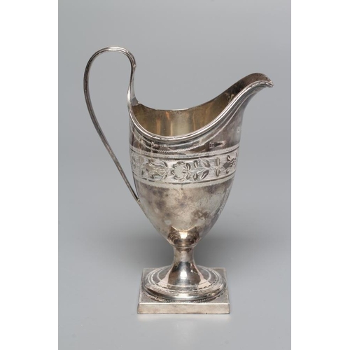 192 - A LATE GEORGE III SILVER HELMET MILK JUG, maker Soloman Hougham, London 1795, with reeded loop handl... 