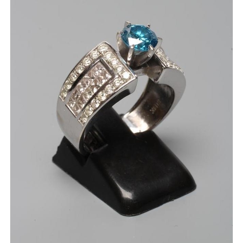 314 - A BLUE AND WHITE DIAMOND COCKTAIL RING, the round brilliant cut blue stone of 0.8cts claw set to ang... 