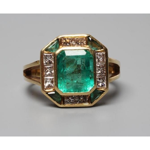 316 - AN ART DECO STYLE EMERALD AND DIAMOND PLAQUE RING, the square cut emerald collet set to a border of ... 