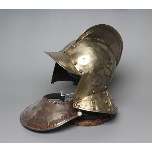 420 - A REPRODUCTION BURGONET HELMET with high medial ridge, rounded peak, neck and ear guards, together w... 