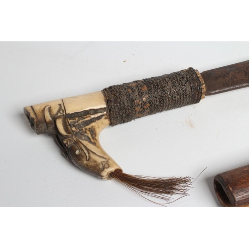 430 - A DAYAK HEAD-HUNTER'S SWORD, the 21