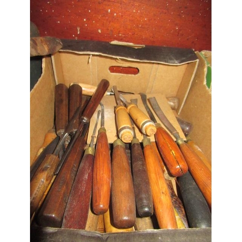 583 - BOX OF WOOD CARVING TOOLS AND CHISELS