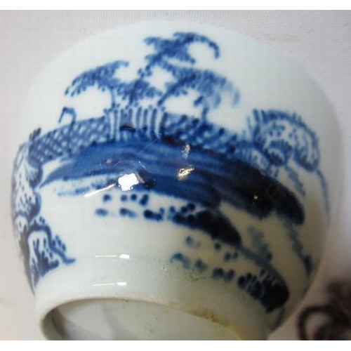 71 - A CHAFFERS PORCELAIN TRIO, 1758-60, painted in underglaze blue with the Trellis Fence pattern, sauce... 