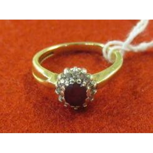 207 - 9CT GOLD GEM SET RING