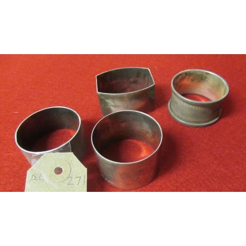 288 - FOUR SILVER NAPKIN RINGS