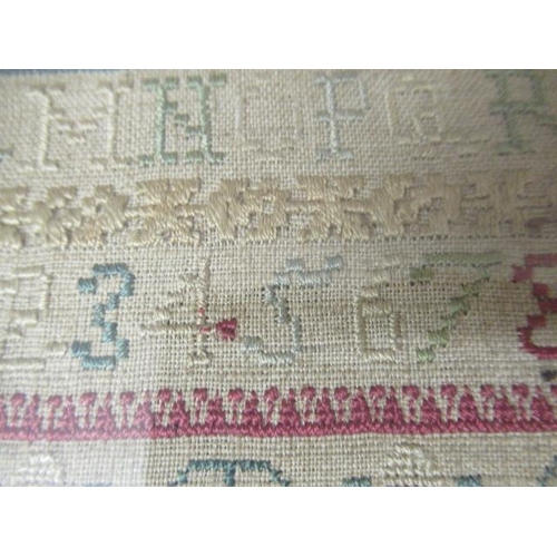 562 - A GEORGE II LONG SAMPLER,1743, worked in coloured silks on a fine linen ground in full, half and oth... 