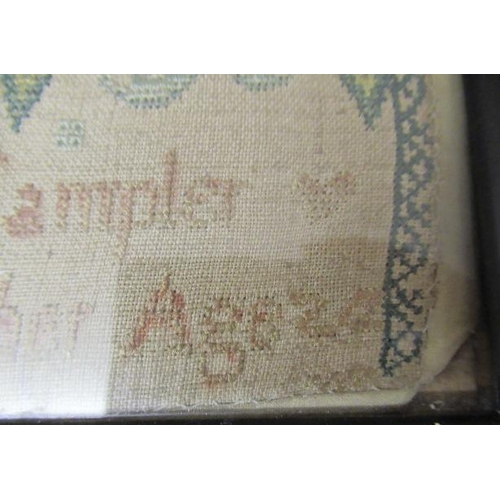 562 - A GEORGE II LONG SAMPLER,1743, worked in coloured silks on a fine linen ground in full, half and oth... 