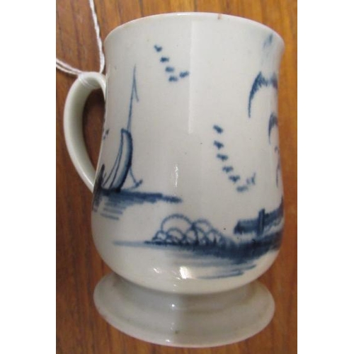 64 - A JAMES PENNINGTON PORCELAIN SMALL MUG, 1763-71, painted in underglaze blue with a fisherman standin... 