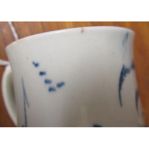 64 - A JAMES PENNINGTON PORCELAIN SMALL MUG, 1763-71, painted in underglaze blue with a fisherman standin... 