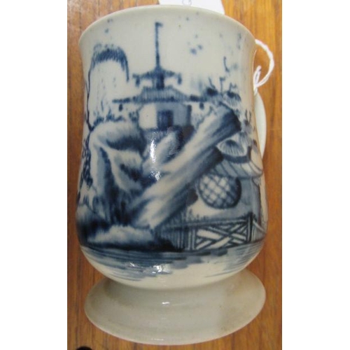 64 - A JAMES PENNINGTON PORCELAIN SMALL MUG, 1763-71, painted in underglaze blue with a fisherman standin... 