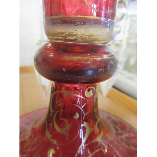 143 - A PAIR OF LATE 19TH CENTURY CRANBERRY GLASS LUSTRES, of typical form, the everted fold over rims ove... 