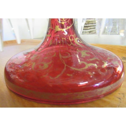 143 - A PAIR OF LATE 19TH CENTURY CRANBERRY GLASS LUSTRES, of typical form, the everted fold over rims ove... 