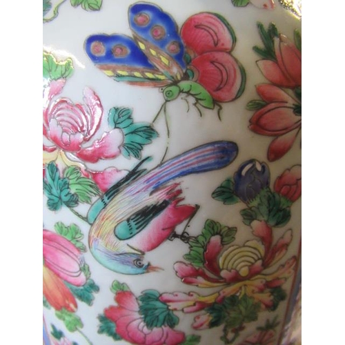 1 - A CANTONESE PORCELAIN FAMILLE ROSE TWO HANDLED ROULEAU VASE painted with two panels of court dignita... 