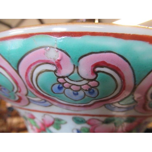 1 - A CANTONESE PORCELAIN FAMILLE ROSE TWO HANDLED ROULEAU VASE painted with two panels of court dignita... 