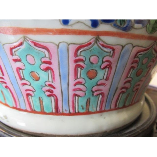 1 - A CANTONESE PORCELAIN FAMILLE ROSE TWO HANDLED ROULEAU VASE painted with two panels of court dignita... 