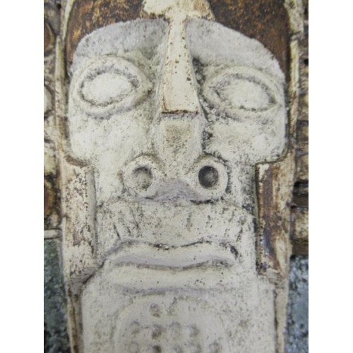 105 - A TROIKA STONEWARE AZTEC FACE MASK, both sides moulded in high relief with stylised faces, one with ... 