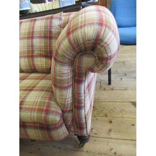 830 - A VICTORIAN WALNUT FRAMED CHESTERFIELD SOFA, upholstered in wool tartan, raised on turned legs with ... 