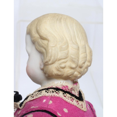 100 - An early ABG bisque shoulder head doll, c. 1890, with moulded hair, painted features, fabric body, b... 