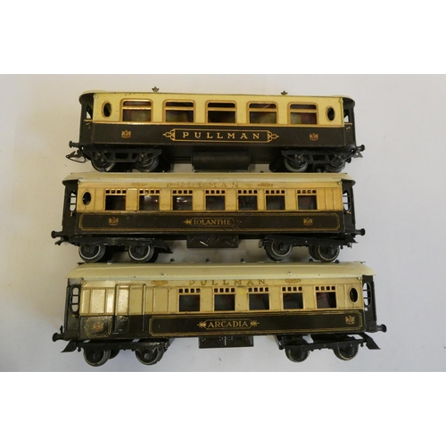 1040 - Three Hornby Pullman coaches including Iolanthe and Arcadian, some paint damage and window deformati... 