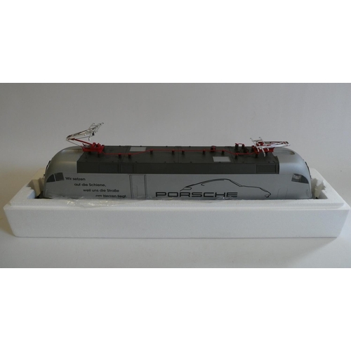 1047 - Piko electric German type pentagraph locomotive finished in silver with Porsche livery, boxed, excel... 