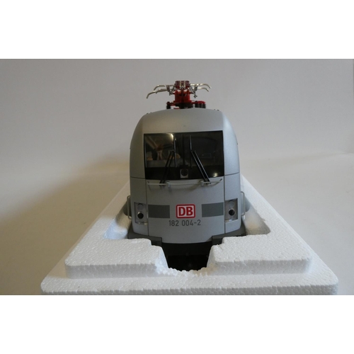 1047 - Piko electric German type pentagraph locomotive finished in silver with Porsche livery, boxed, excel... 