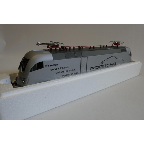 1047 - Piko electric German type pentagraph locomotive finished in silver with Porsche livery, boxed, excel... 