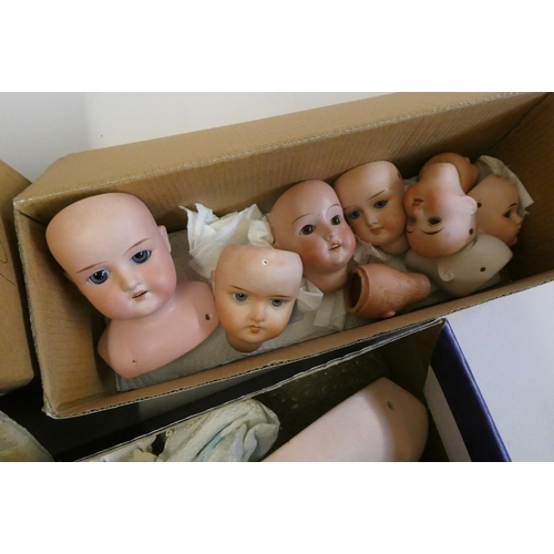 105 - A quantity of bisque, wax and composition doll parts, including an AM 370 9 DEP shoulder head, an AM... 