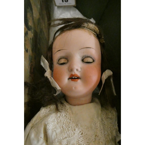 13 - 4 German bisque head dolls, comprising a 13 3/4