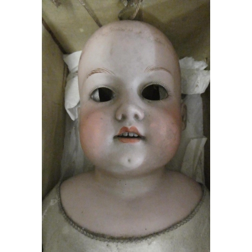 13 - 4 German bisque head dolls, comprising a 13 3/4