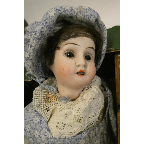 13 - 4 German bisque head dolls, comprising a 13 3/4