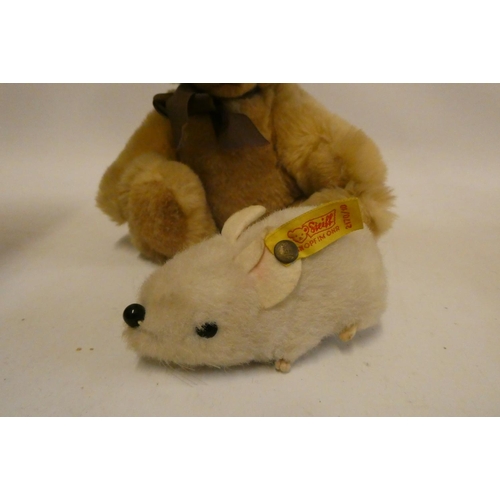 131 - Four Steiff plush toys, comprising a Petsy dog, with googly eyes and white metal ear button, 11