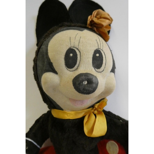 142 - Merrythought Minnie Mouse, with fabric face, plush body, felt clothing and maker's label to foot, 14... 