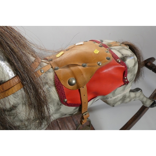 150 - Vintage rocking horse, wooden body, glass eyes, dappled grey paint, horse hair mane and tail, leathe... 