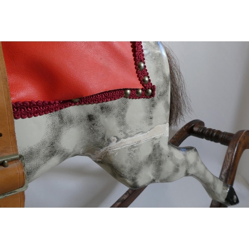 150 - Vintage rocking horse, wooden body, glass eyes, dappled grey paint, horse hair mane and tail, leathe... 