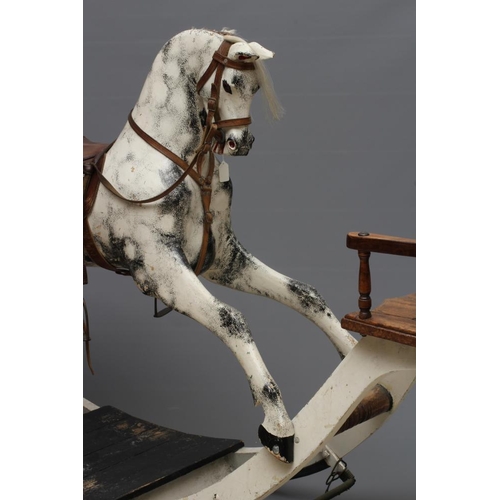 153 - A G & J Lines rocking horse, late 19th century, of carved wood construction painted in dappled grey,... 