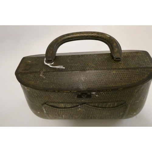 161 - A Huntley & Palmers hand bag biscuit tin, Rd. No. 493911