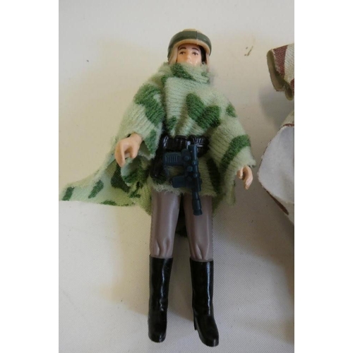 208 - 3 Star Wars figures, comprising Princess Leia Organa in comba poncho, Hans Solo in trench coat and C... 