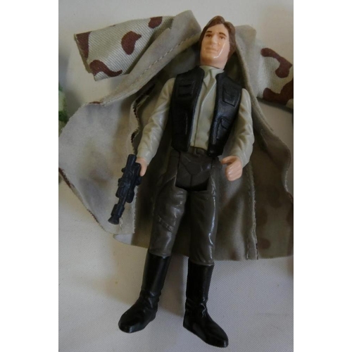 208 - 3 Star Wars figures, comprising Princess Leia Organa in comba poncho, Hans Solo in trench coat and C... 